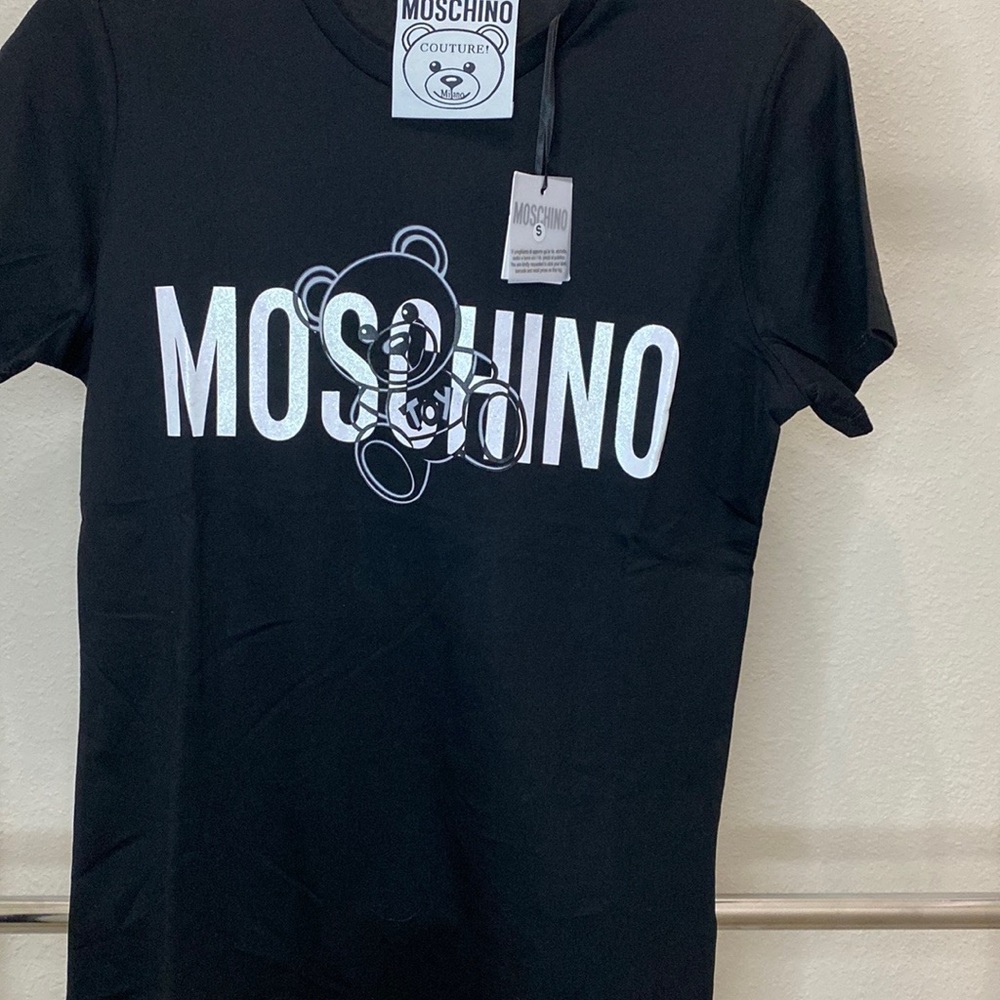 Black women's T-Shirt with glossy white print of the brand